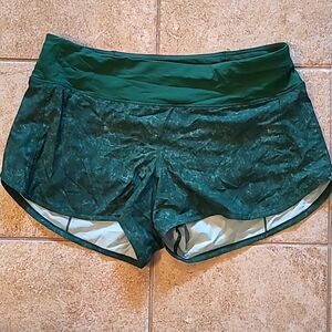 Size 10 lululemon green speed shorts 4" inseam